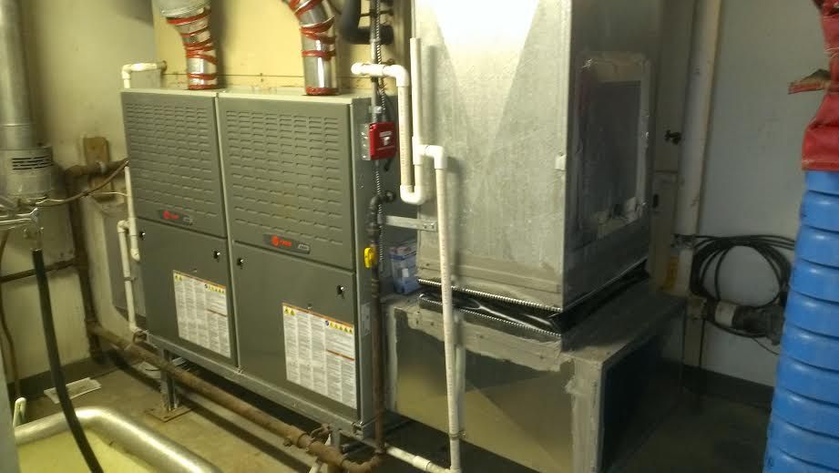 2 warm air furnaces working in tandem