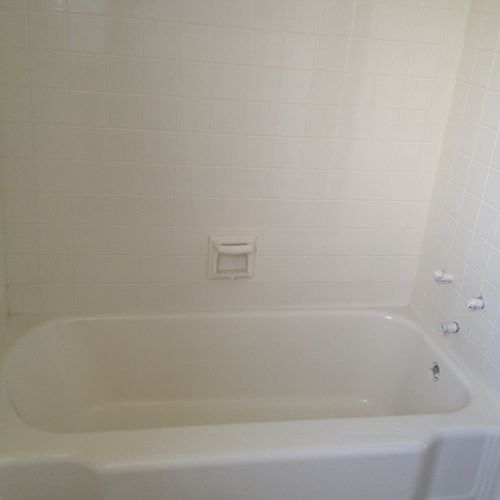 Tub After - Bright white.  Looks like new and read