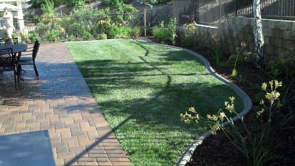 Interlocking paver patio, sod installation