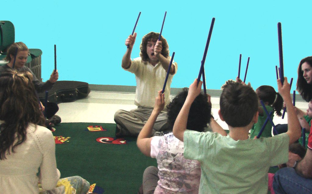 Leading a workshop on family music-making at a pub