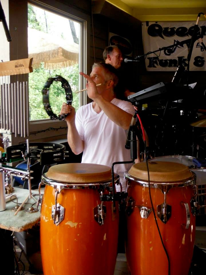 Playing percussion with the Queen City Funk and So