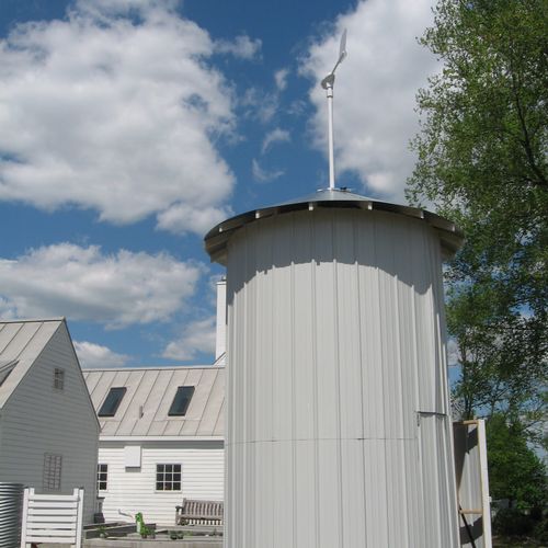 A silo I built with a windmill and solar panels th