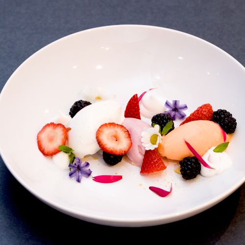 Ice cream and sorbet trio with fresh berries and c