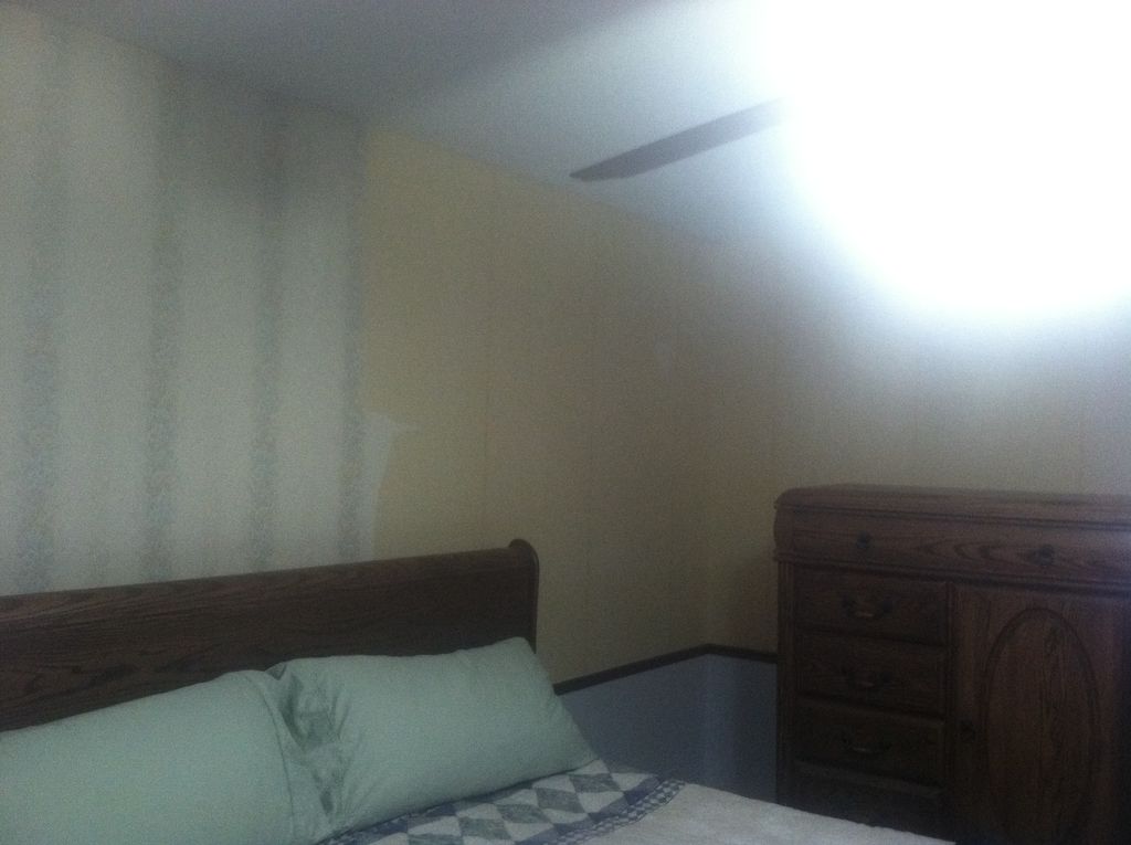 BEFORE photo: Removing wallpaper and trim board in