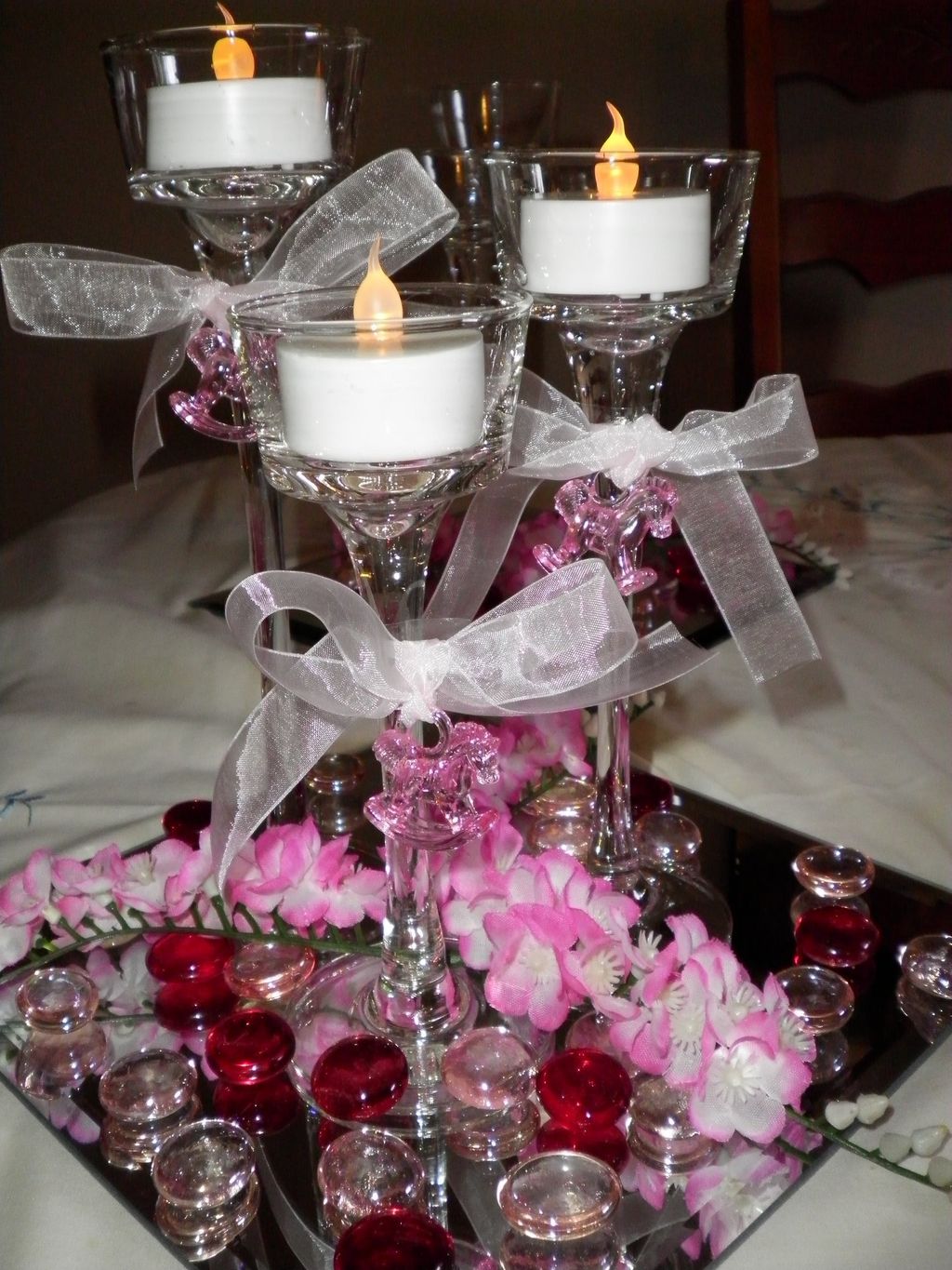 A centerpiece for a table at a baby shower for a b