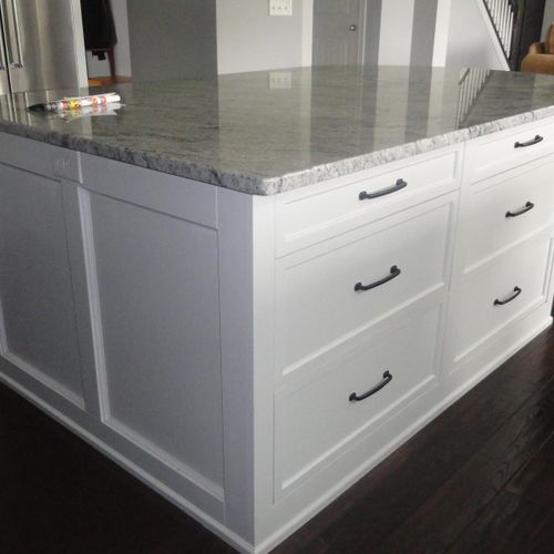 kitchen island with drawers and seating
