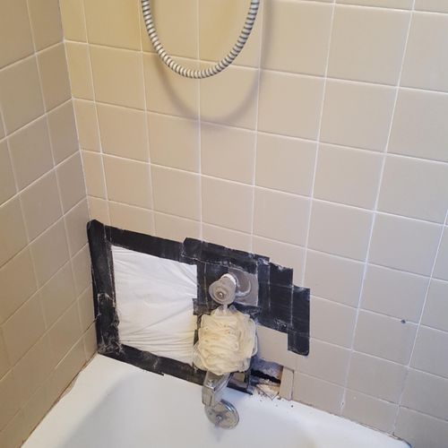 Shower/tub unit that has rotted and needs repair.