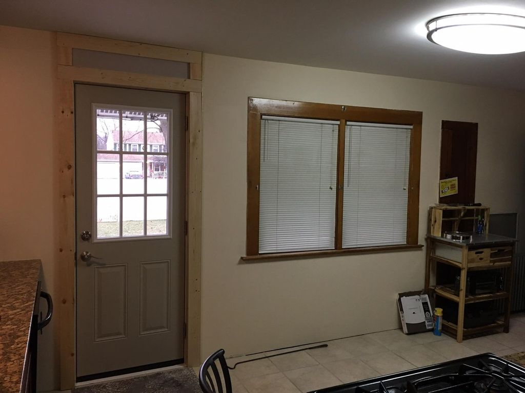 New exterior door cut into kitchen wall for access