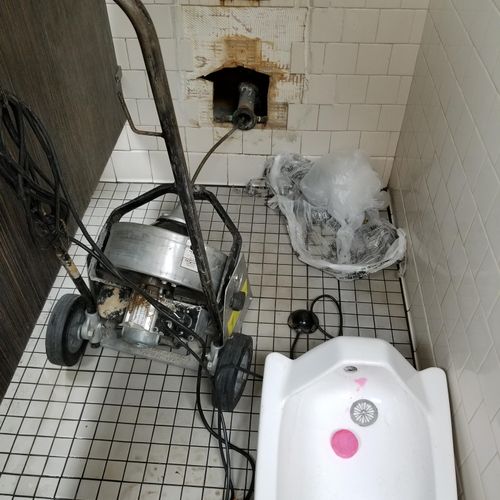 using a high performance machine to clear drain