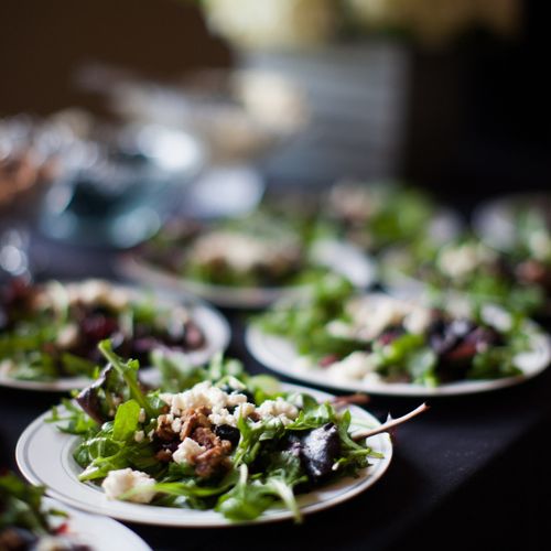 Our signature salad. Baby Greens, dried cranberrie