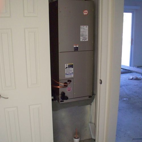 closet air handler in apartment rehab after fire