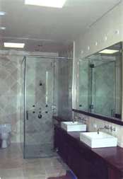 Frameless shower enclosure makes a bathroom bright