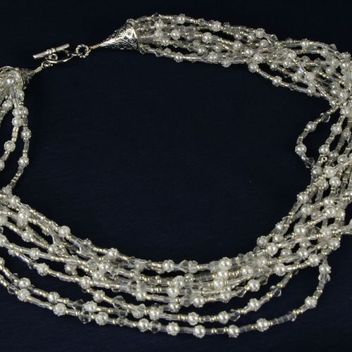 Sparkling crystals make this multi-strand necklace