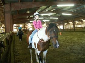 Arena riding during a recent Summer Camp at The Ri