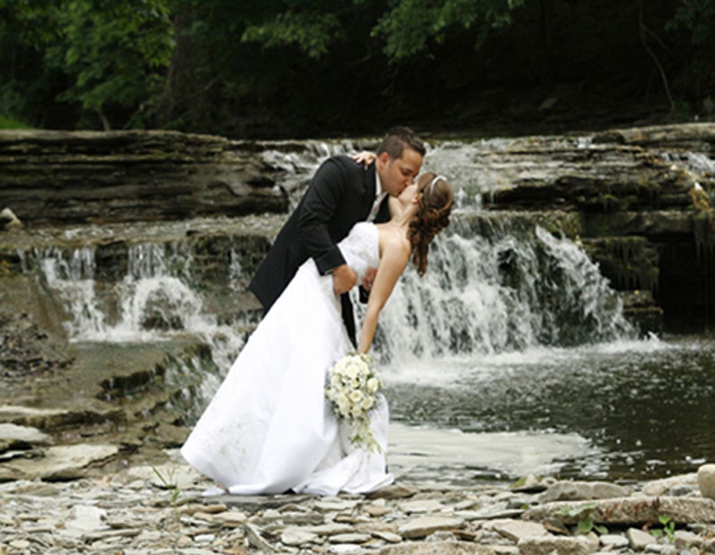 A beautiful setting, a beautiful couple, with wate