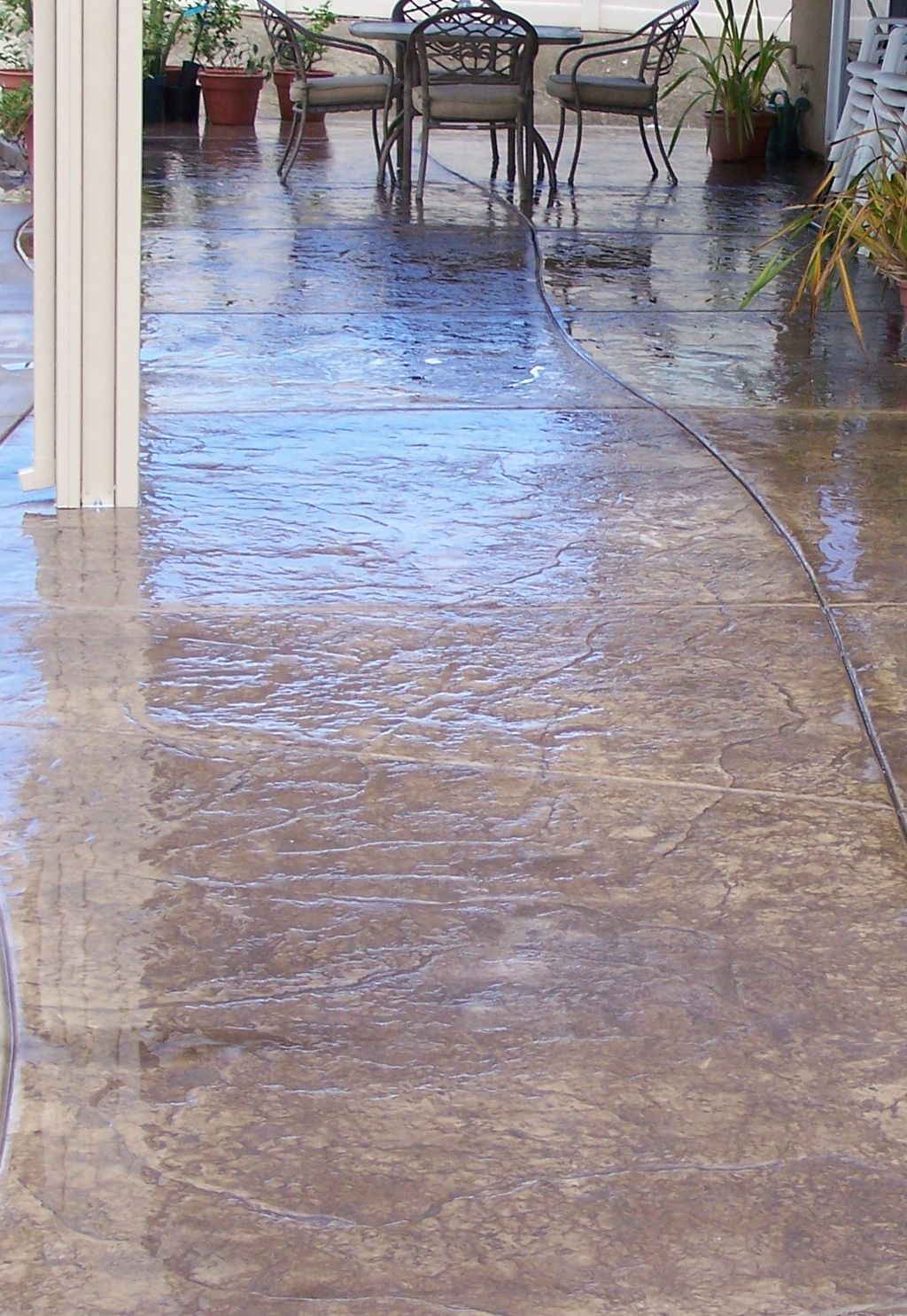 Multi-colored, texure stamped Concrete. Concrete i