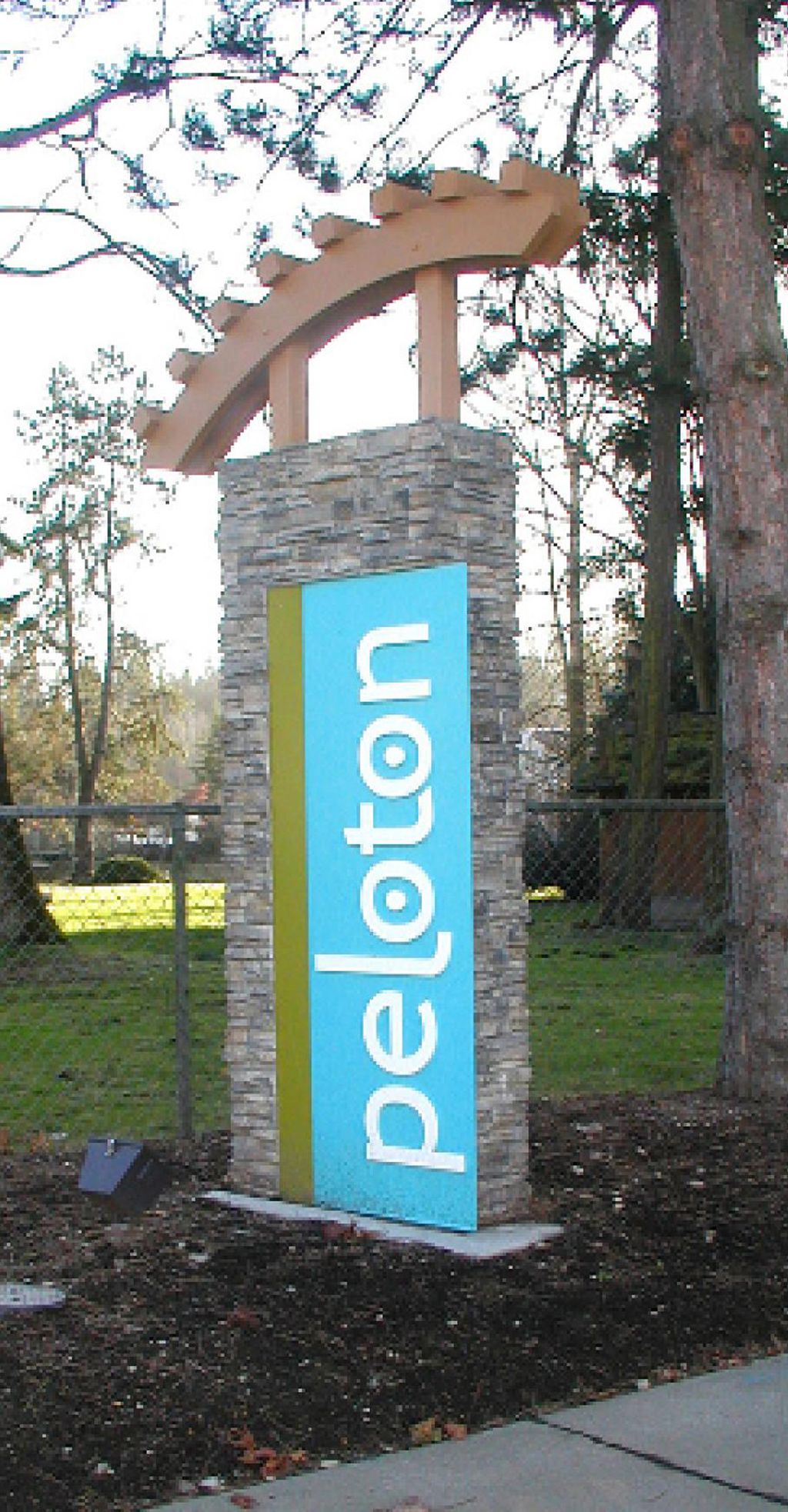 Peloton Apartments Entrance Monument
