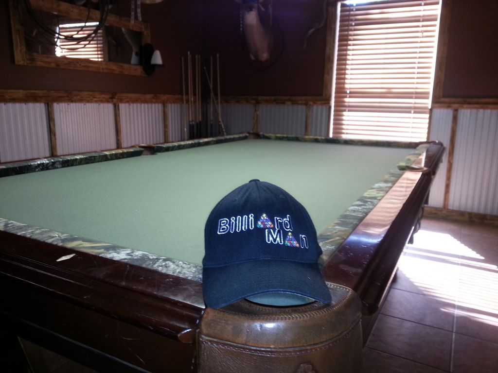 Mossy oak camo rails with olive bed cloth.