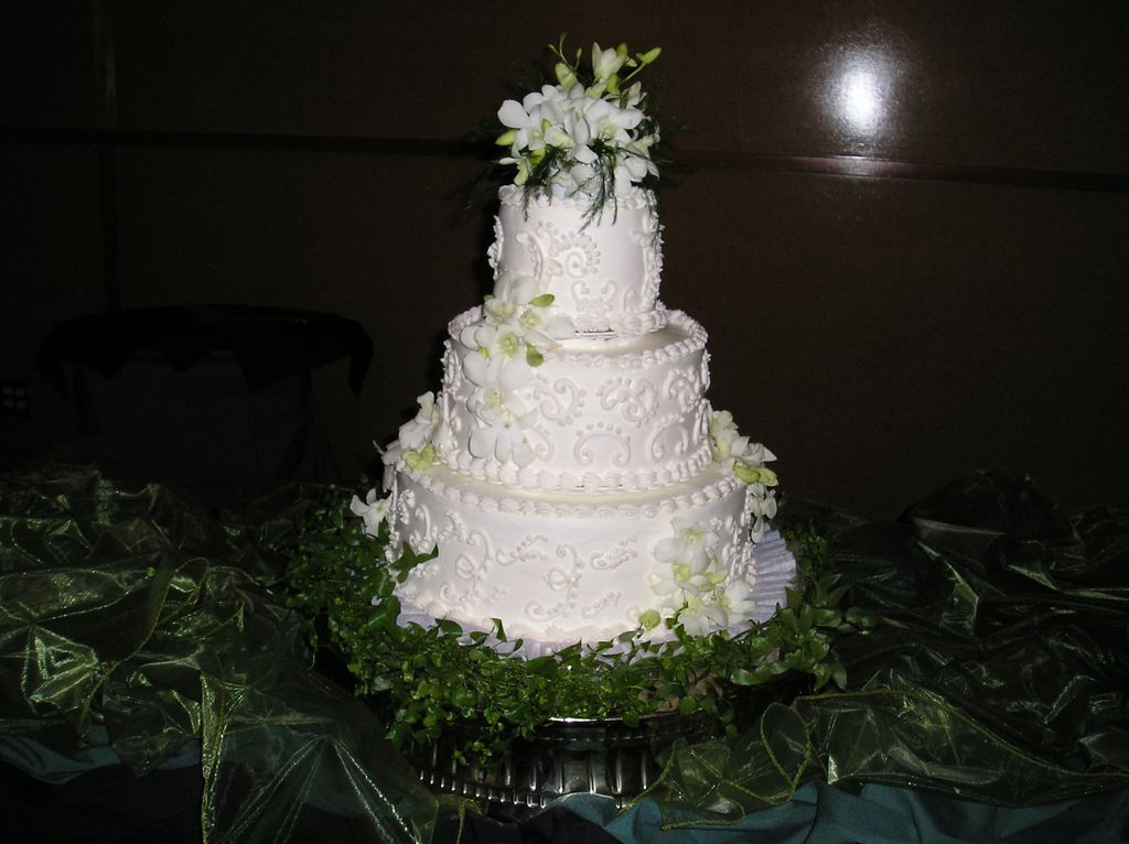 Wedding cake with dendrobium orchids.  How elegant