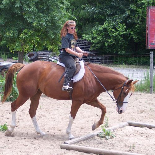 Riding Instructor Julie and her paint mare JJ Foxy