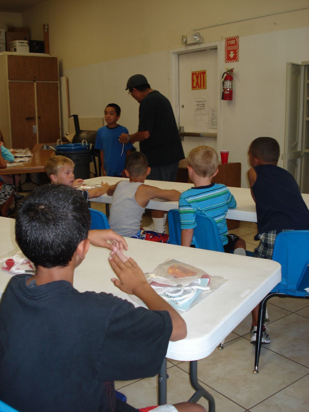 Children work in small groups to practice performi