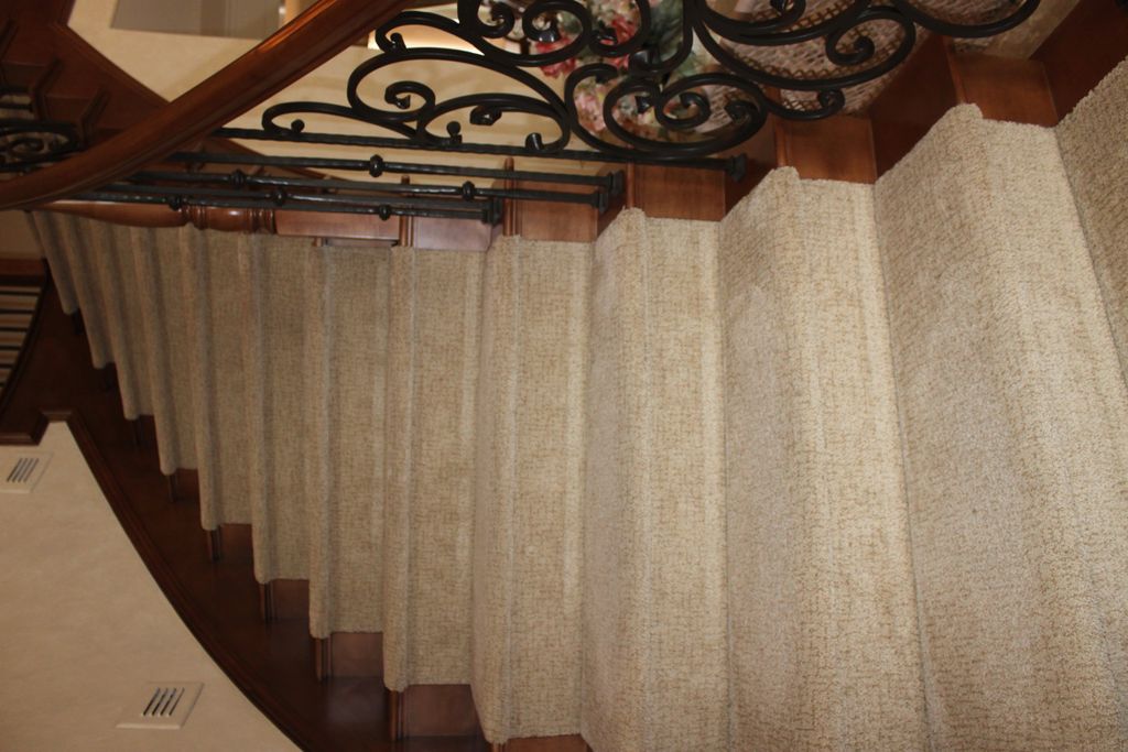 Updated staircase with new rails and carpet