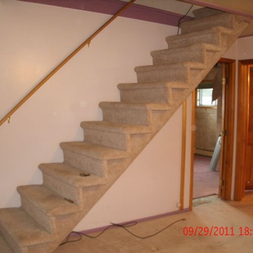 new open stairs complete with carpeting