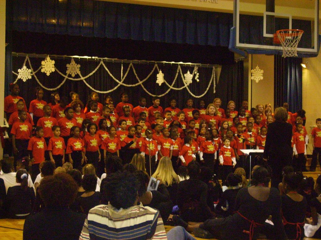 Me conducting my choir at the performing arts magn