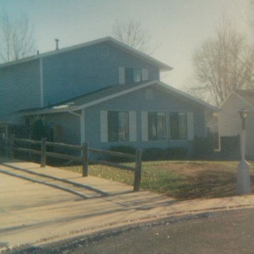 Longmont house after siding