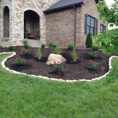 (Front view of job) All stone, grasses, roses, map