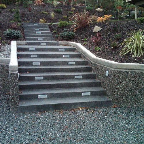 Texture stamped stairs with exposed aggregate reta