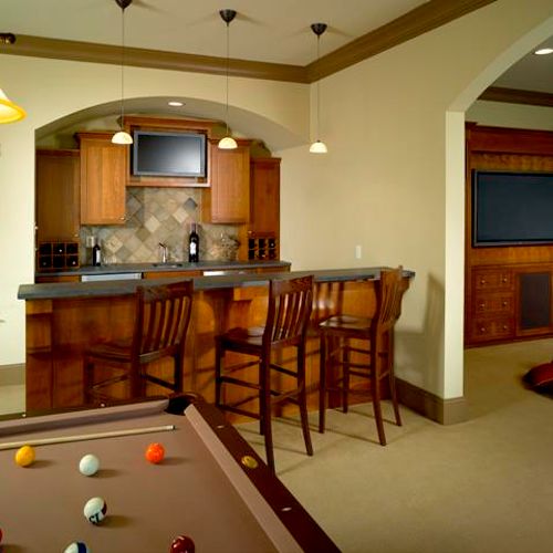 Great bar in the basement remodel by Masterworks A