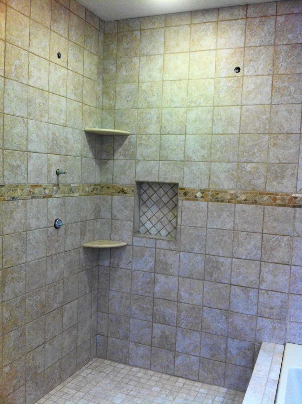 A custom mud shower pan and surround I built for a