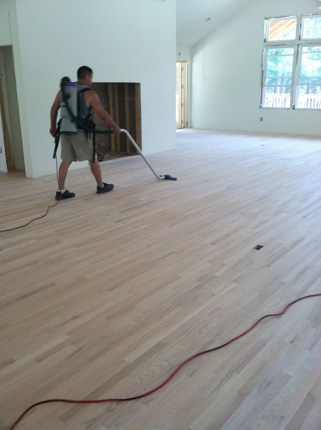 Hardwwod floor refinishing for a local church camp