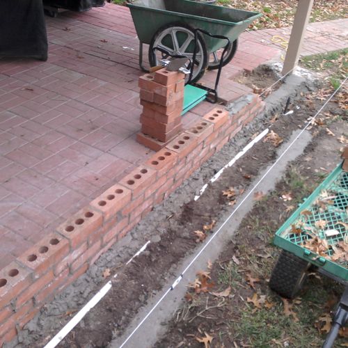 Raised flowerbed
18 by 2
Brick
Sprinkler system