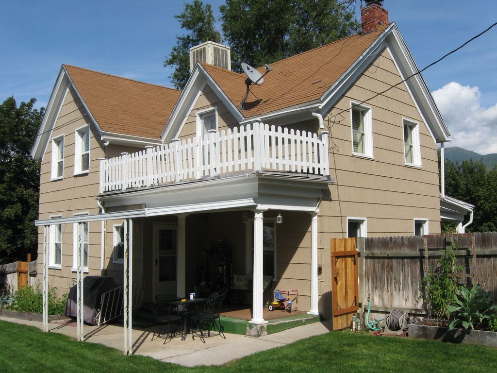 The after photo of an exterior siding and trim job