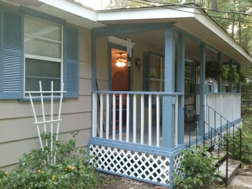 We replaced rotted wood and painted this small hom