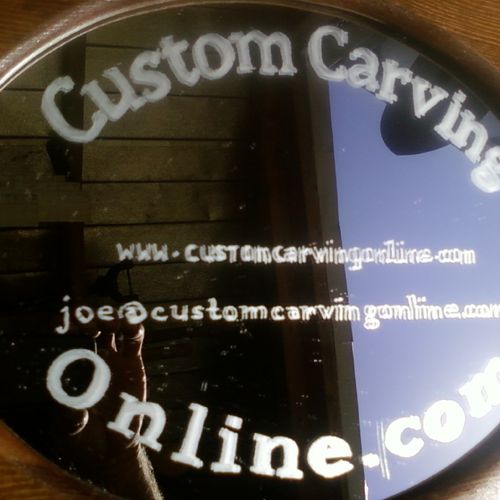 Etched glass  advertising sign...all done by hand.