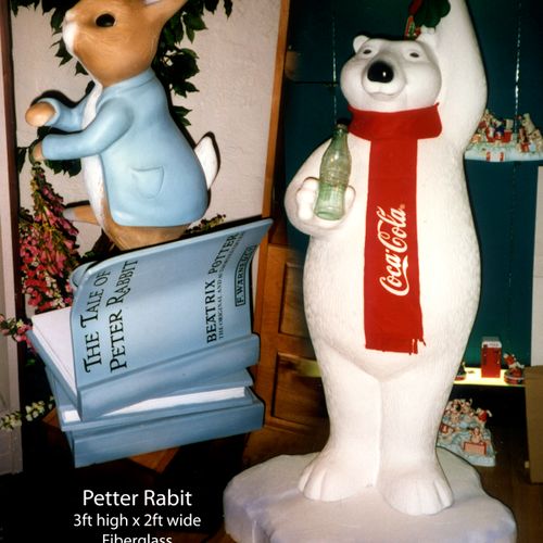 "Peter Rabbit" cast fiberglass 4 feet tall.  "Coca