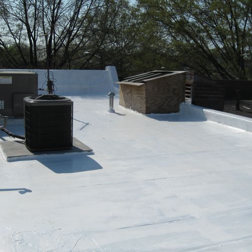 Commercial flat roof repair and Weather Barrier co