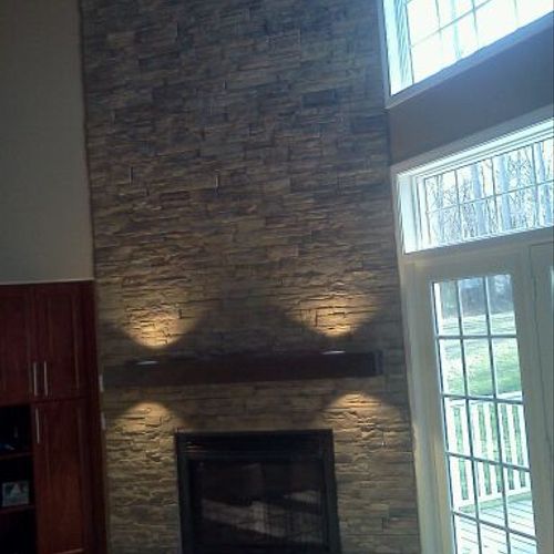 mantel , stone work and lighting done by American