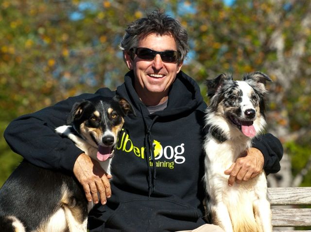 Charlotte dog trainer Greg Bellew with Allie and T