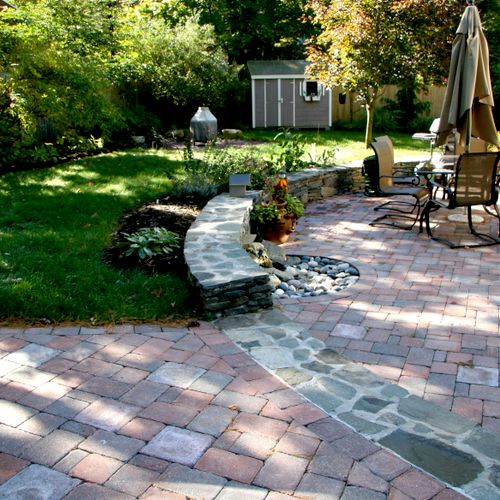 Winchester, MA. Paver patio with a water feature a