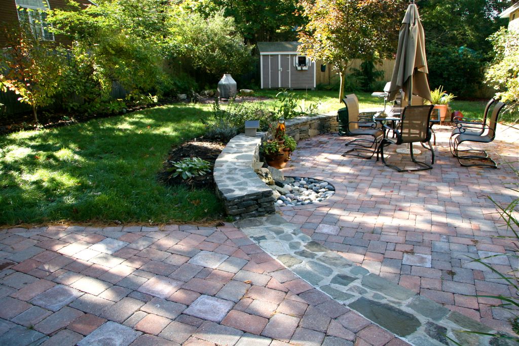 Winchester, MA. Paver patio with a water feature a