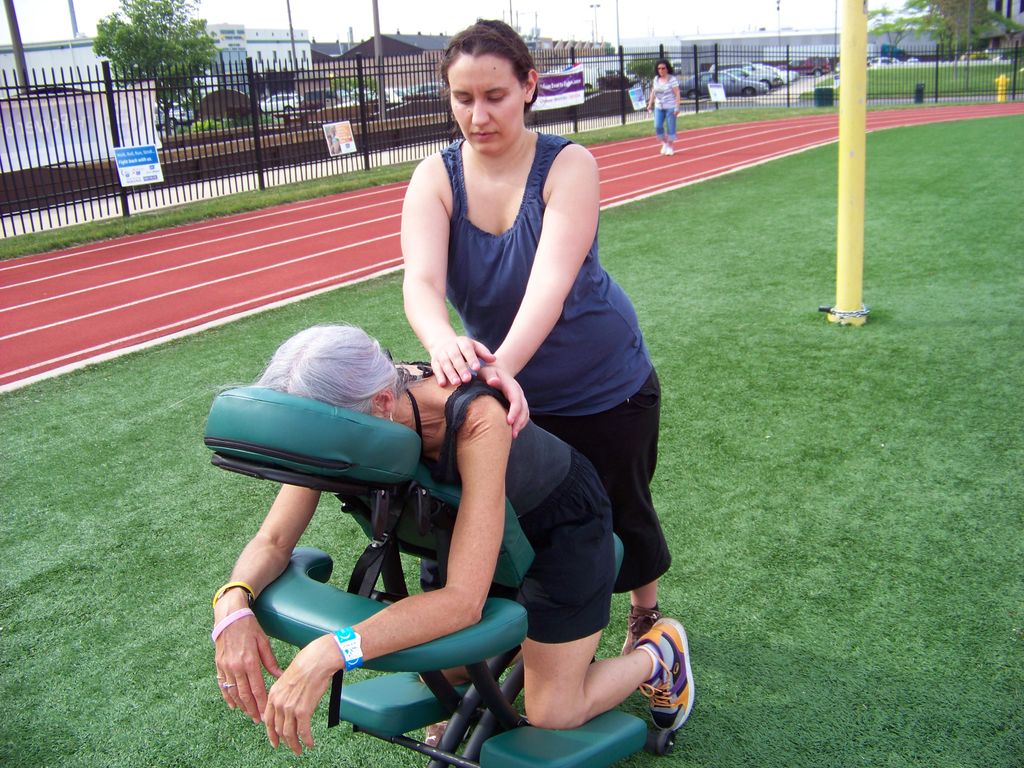 Volunteering chair massage services to volunteers 