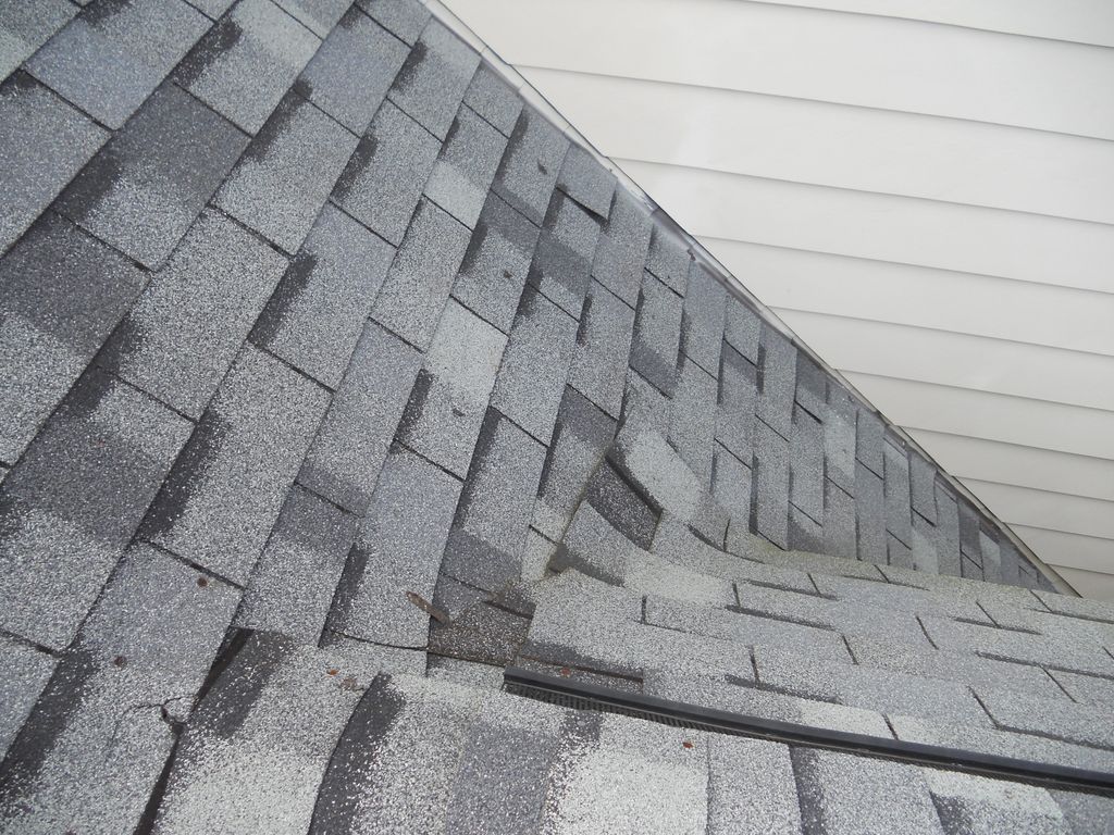 Back side of a dormer on an 850,000 roof. The shin