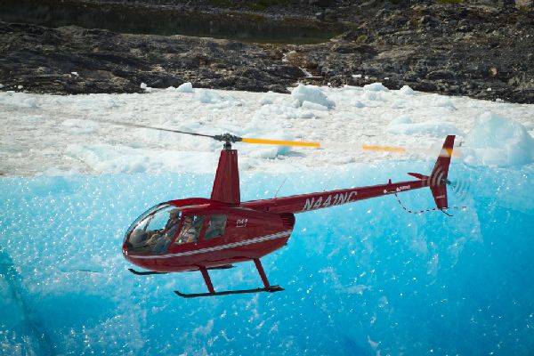 Helicopter tours and landings among Alaska's glaci