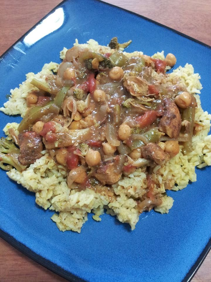 Chicken and Veggie Curry over seasoned Rice.