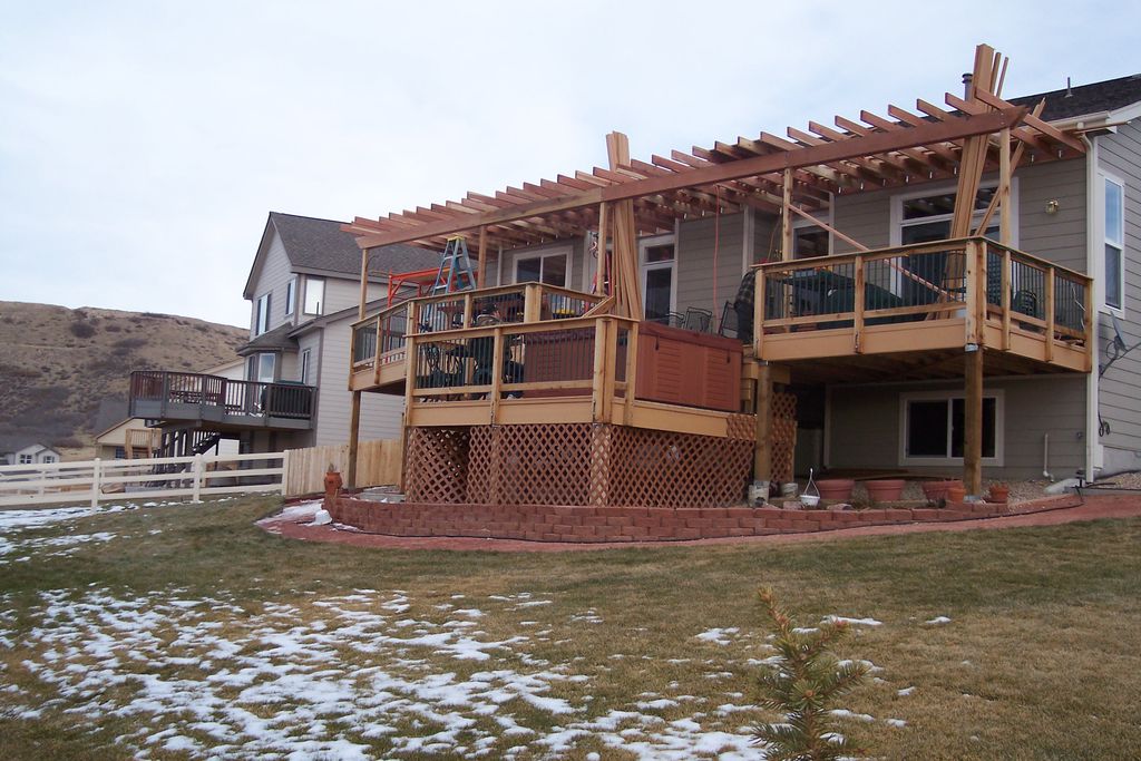 Multi level hot tub deck with pergola.