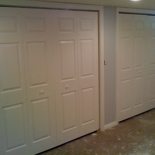 6 panel bi-fold doors, painted white